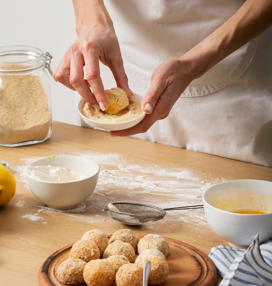 hand crafting golden breaded bites